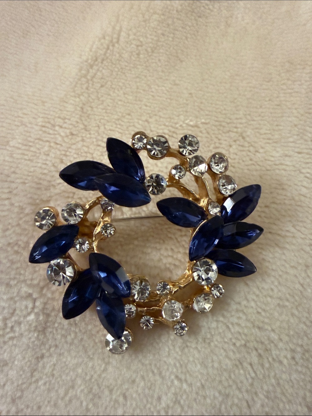 Gold-Tone Brooch with Sapphire-Blue Marquise Stones and Clear Crystals